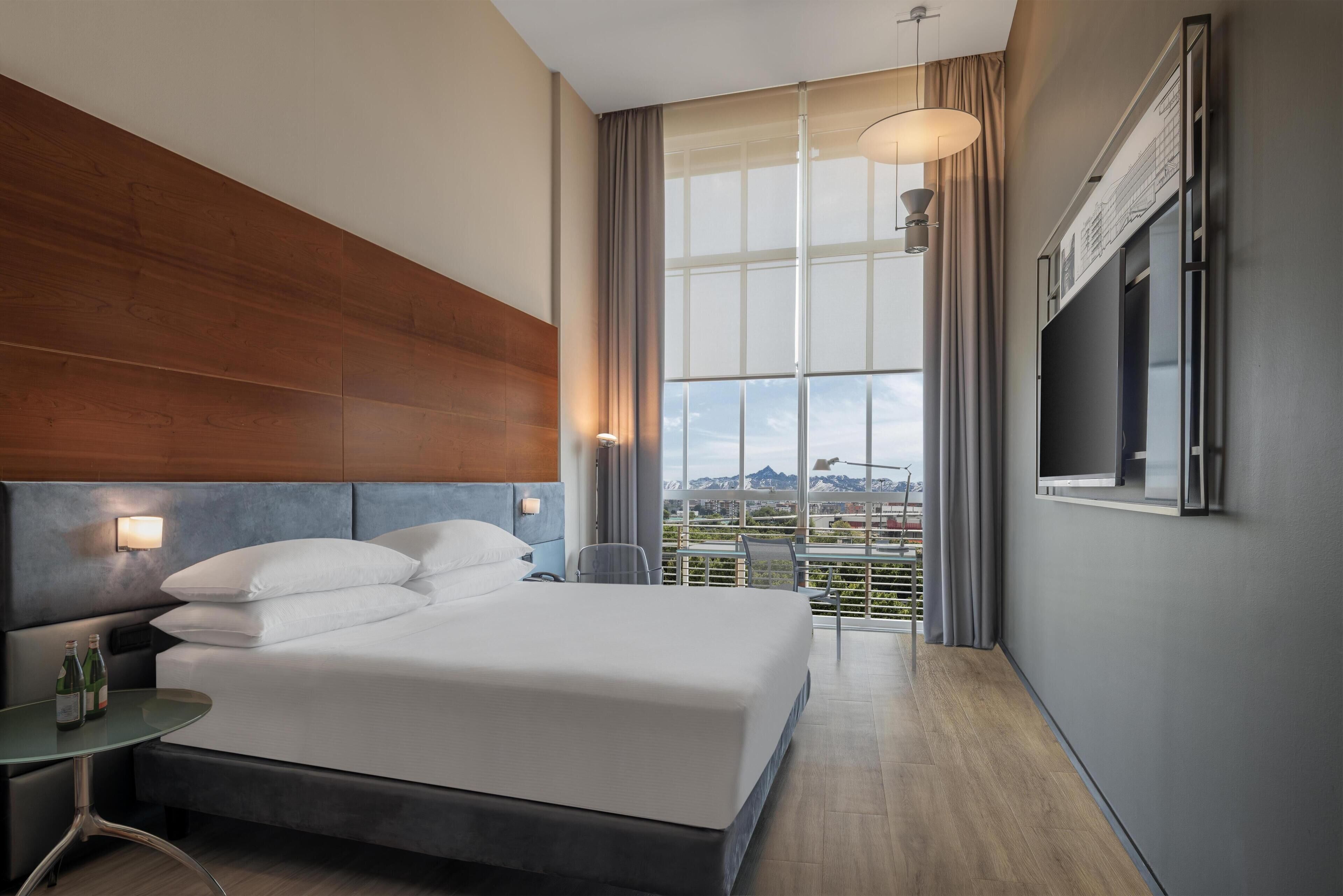 Hypo-allergenic bedding, down duvets, minibar, in-room safe