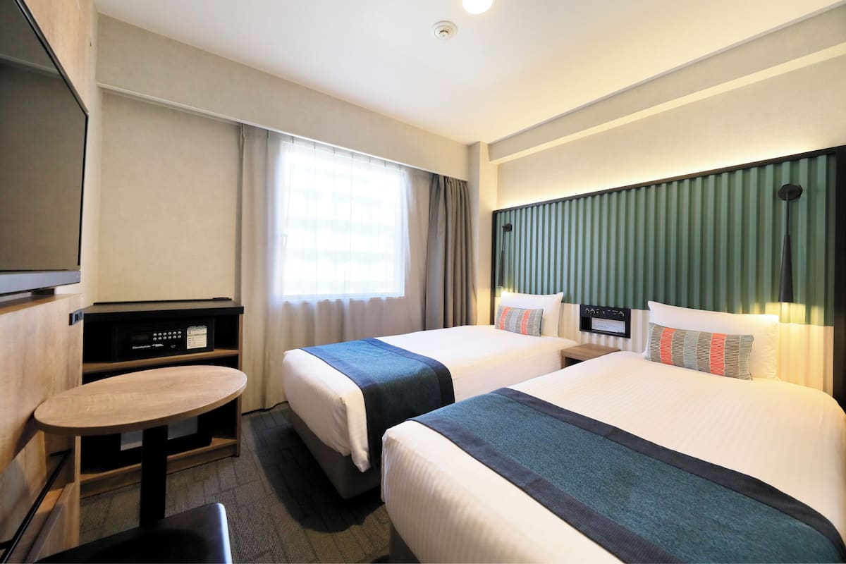 14 Sqm, Standard Twin Room (Bed Type: Single bed is arranged) | Down comforters, in-room safe, WiFi (free), bed sheets