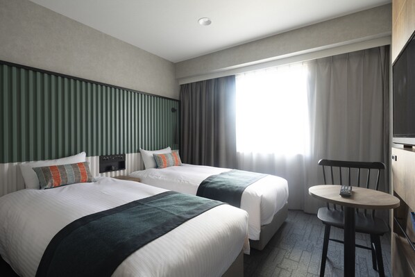 Chambre supérieure avec lits jumeaux (Bed Type: Single bed is arranged) | Couette en duvet, coffre-fort, bureau, accÚs au Wi-Fi (inclus)