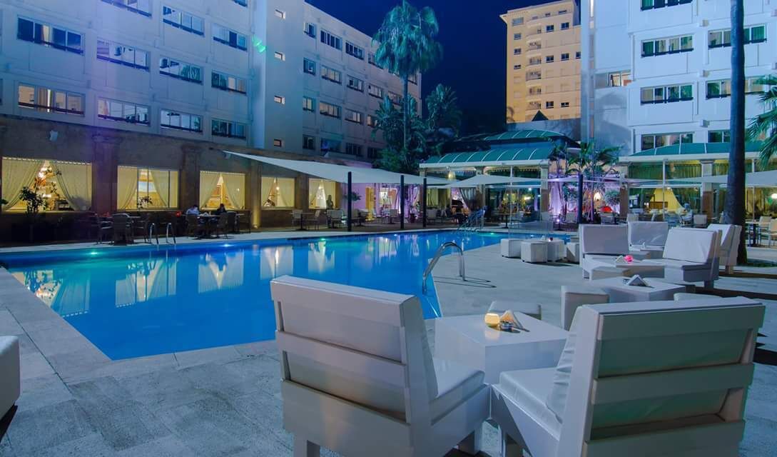 Outdoor pool, pool umbrellas, pool loungers