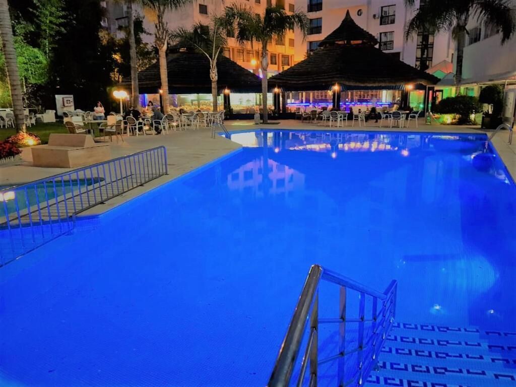 Outdoor pool, pool umbrellas, sun loungers