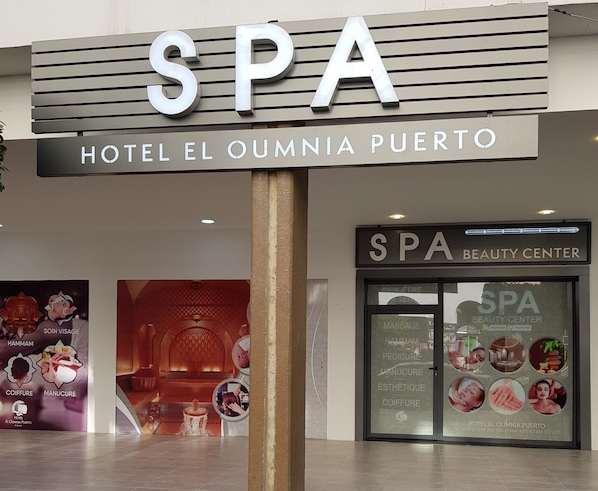 Een bordje voor SPA Beauty Center in Hotel El Oumnia Puerto.