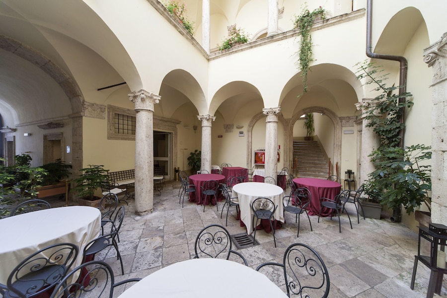 Historic courtyard at Palazzo Guiderocchi in Ascoli Piceno