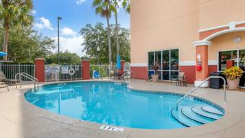 Outdoor pool, pool umbrellas, sun loungers