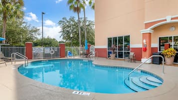 Outdoor pool, pool umbrellas, sun loungers