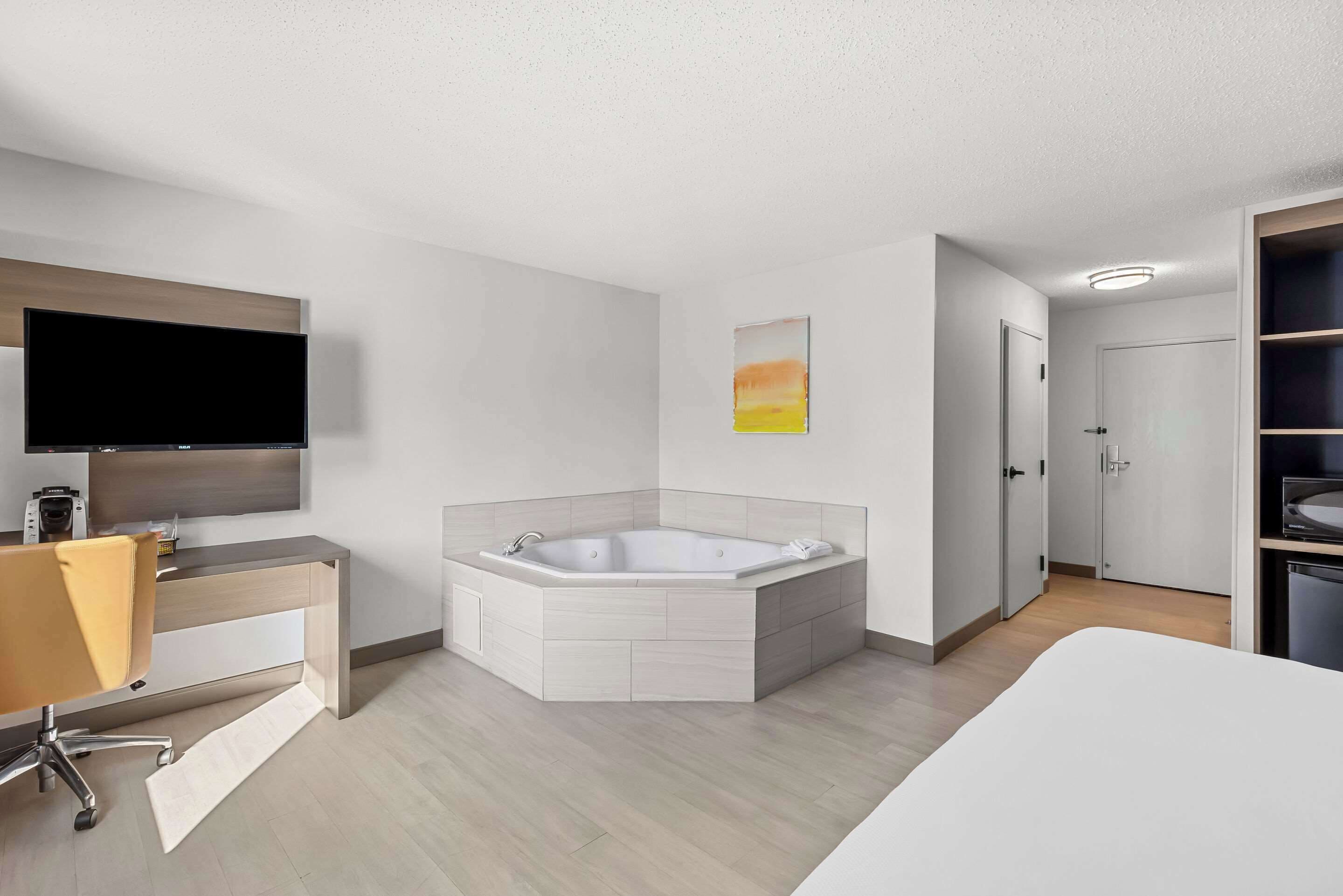 room, 1 king bed, accessible, non smoking | in-room safe, desk, blackout curtains, iron/ironing board