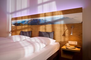 Habitació triple | Minibar, caixa forta a l'habitació i cortines opaques 