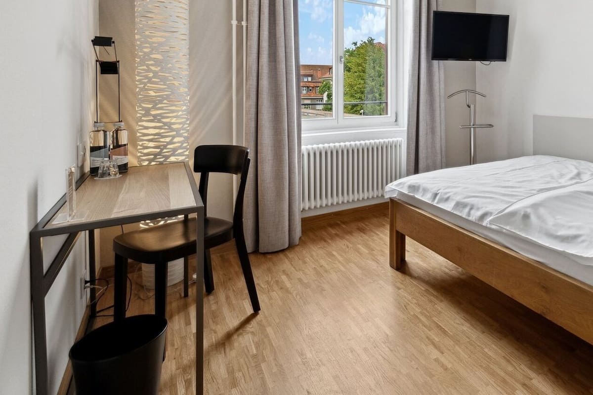 Chambre simple supérieure, non-fumeur | Literie hypoallergénique, coffre-fort, décor unique, ameublement unique