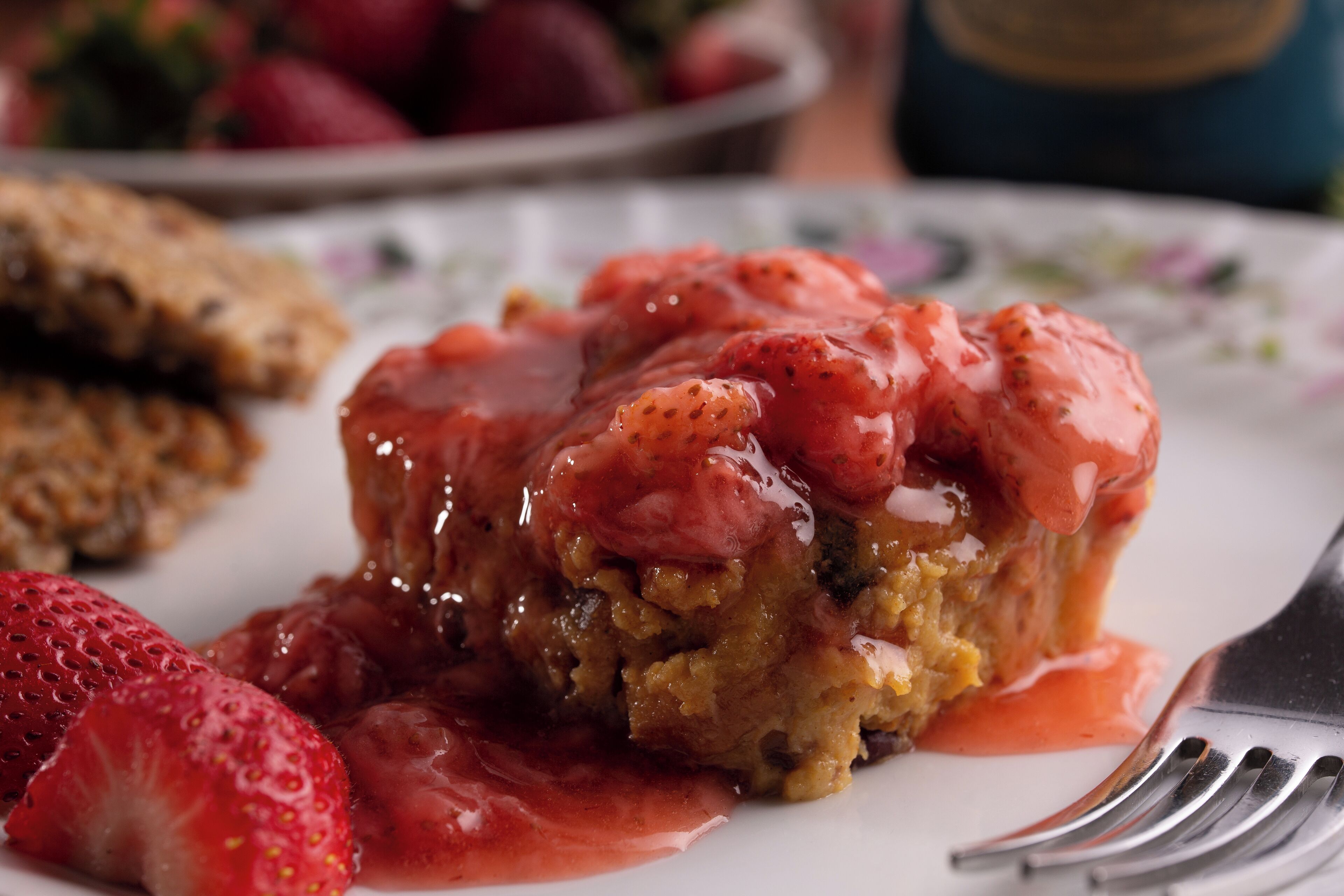A dessert with strawberries on a plate.