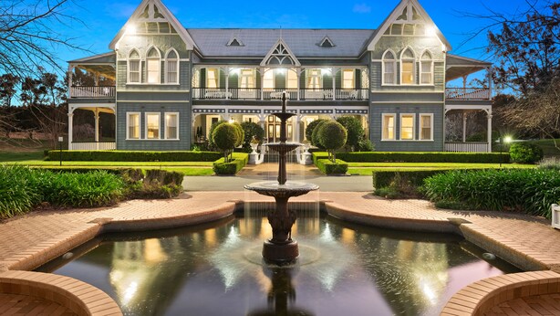 A large, historic building with a symmetrical facade, a central fountain, and well-manicured gardens. - The Convent Hunter Valley Hotel (Pokolbin)