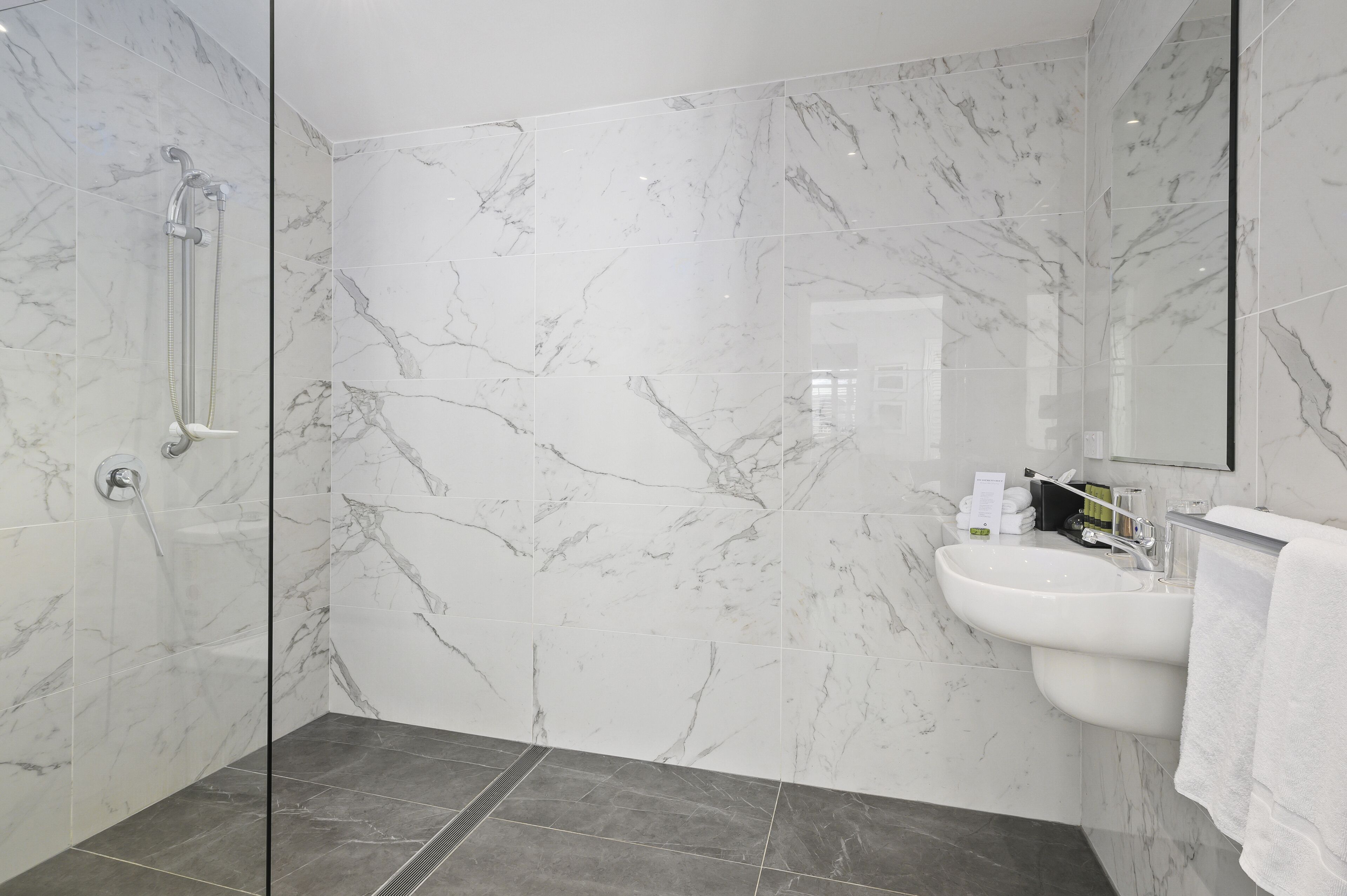 suite, garden view | bathroom | designer toiletries, hair dryer, bathrobes, towels