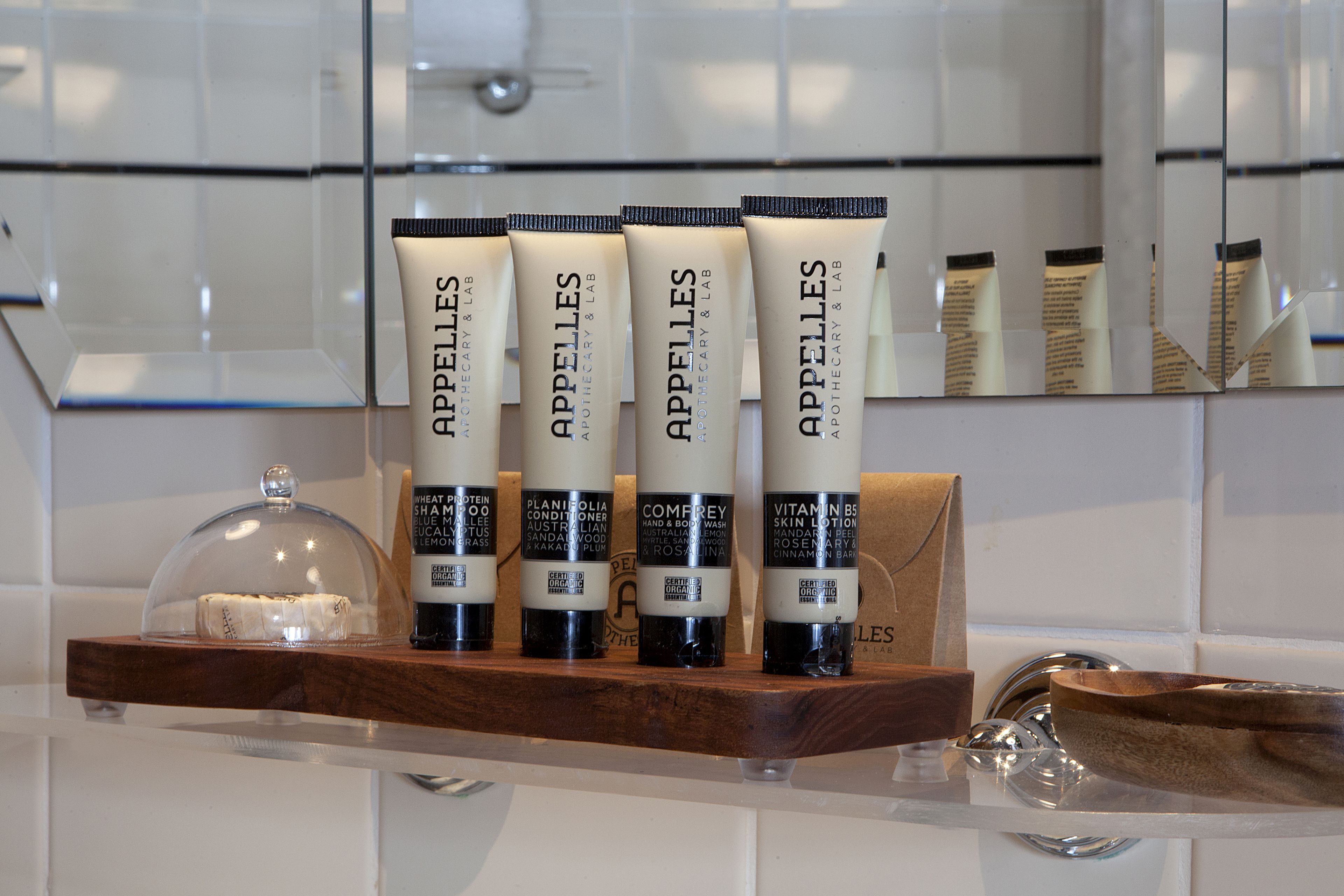 designer toiletries, hair dryer, bathrobes, towels