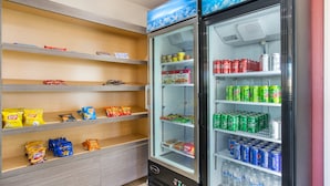 A vending machine with snacks and drinks. - Baymont by Wyndham Socorro (Socorro)