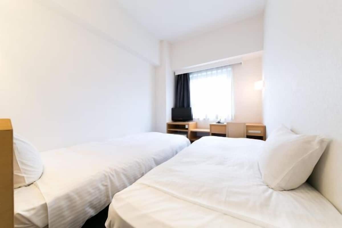 Down comforters, desk, blackout drapes, iron/ironing board (on request)