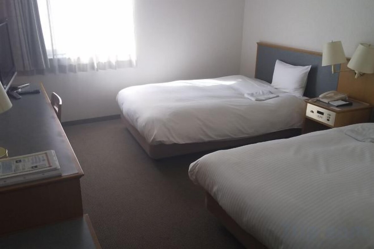 Down duvets, desk, blackout curtains, iron/ironing board (on request)