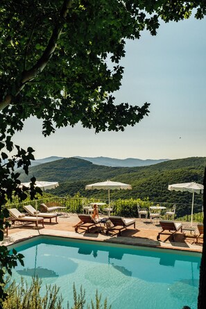 Outdoor pool, pool umbrellas, sun loungers