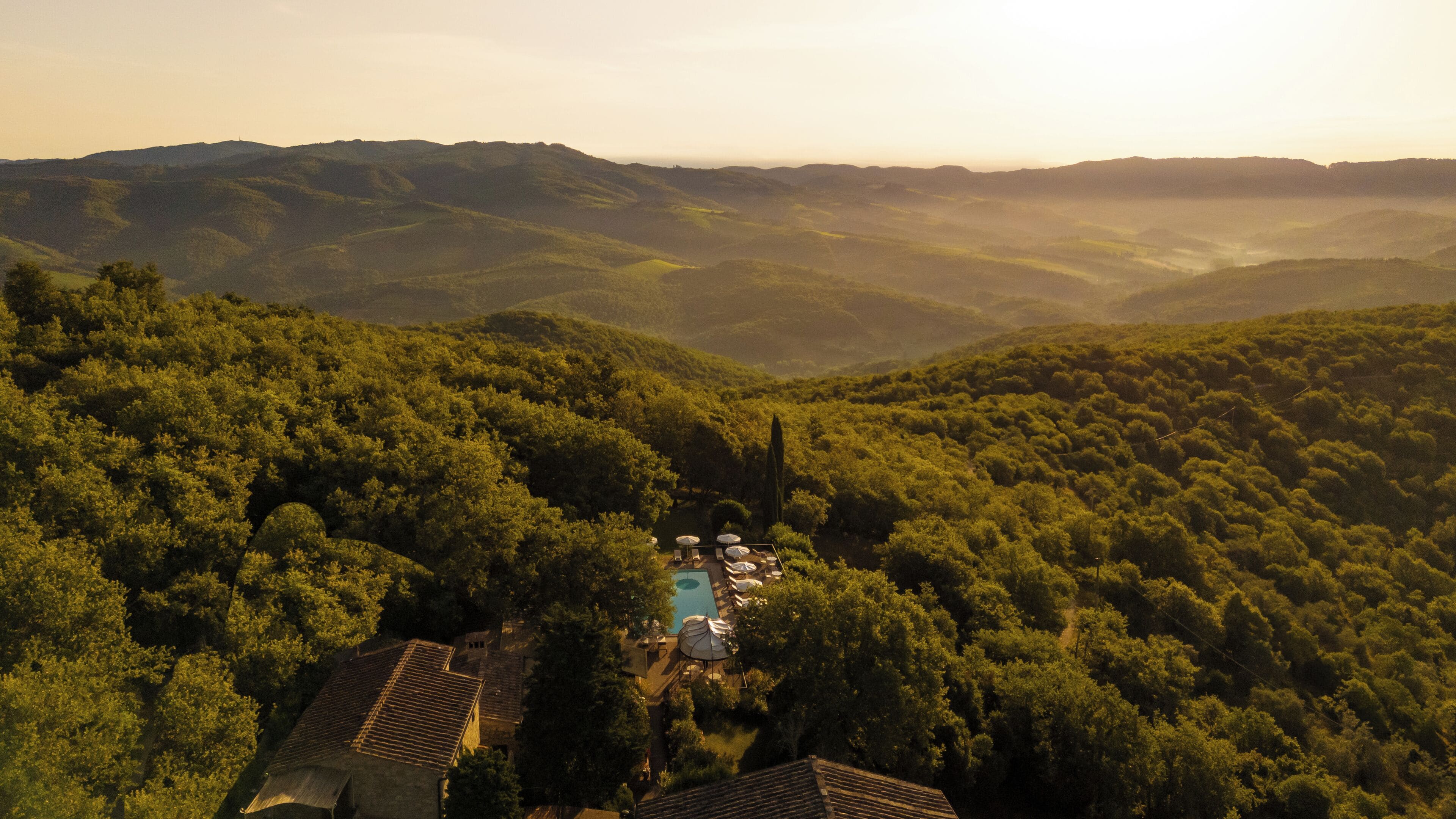 outdoor pool, pool umbrellas, pool loungers