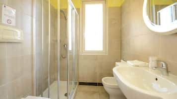 Hair dryer, bidet, towels, shampoo