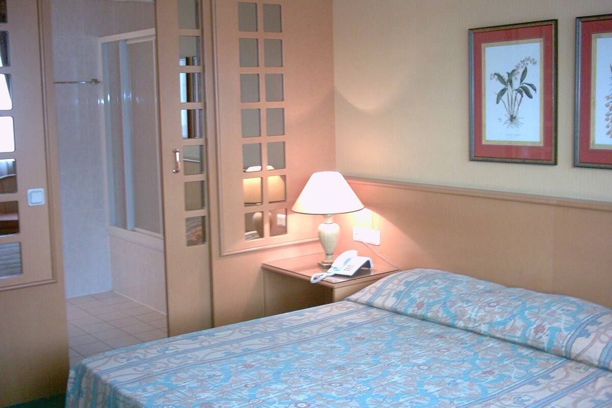 Minibar, blackout drapes, iron/ironing board, cribs/infant beds