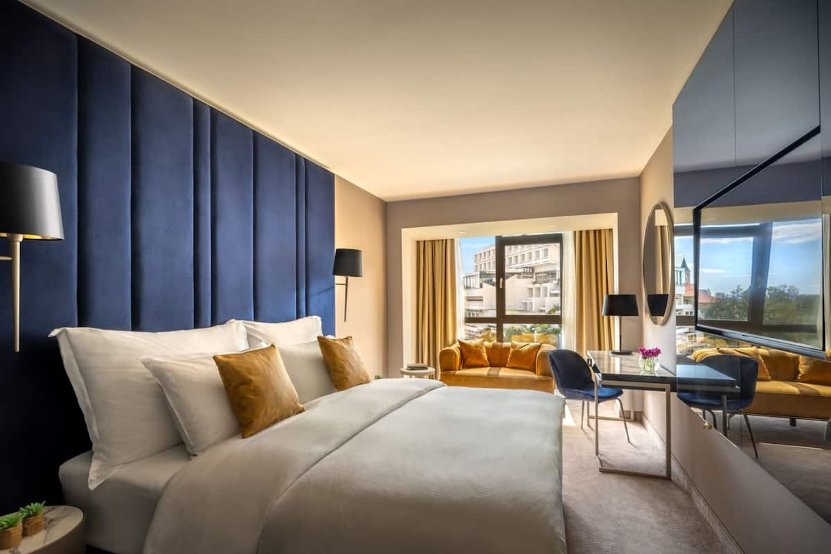 Superior Double or Twin Room, Partial Sea View | Down comforters, minibar, in-room safe, desk