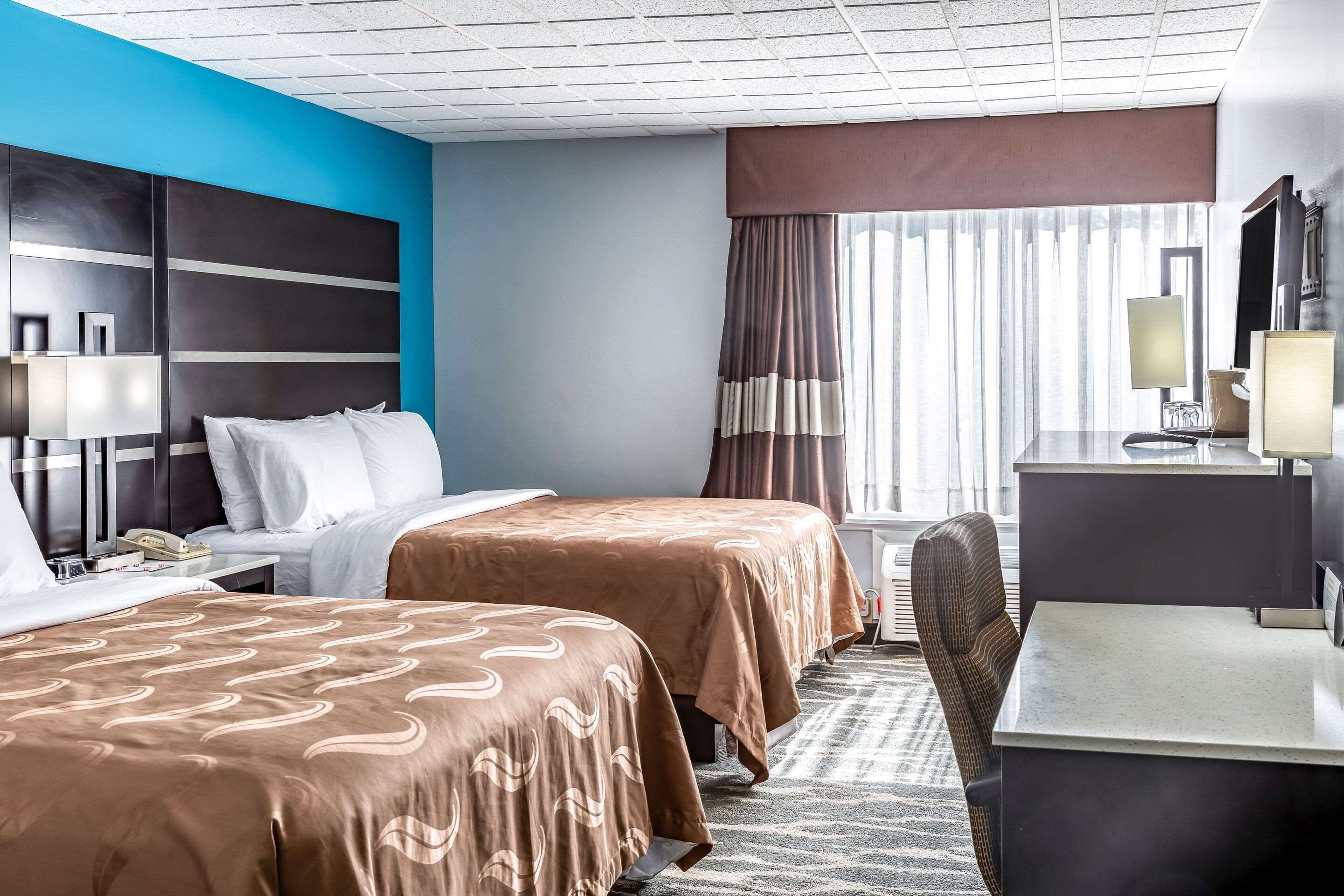 Blackout curtains, iron/ironing board, free cots/infant beds