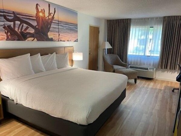 Desk, laptop workspace, blackout curtains, iron/ironing board