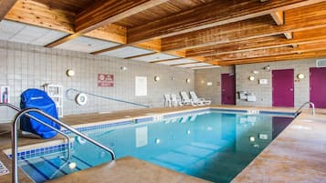 Indoor pool, open 8:00 AM to midnight, pool loungers