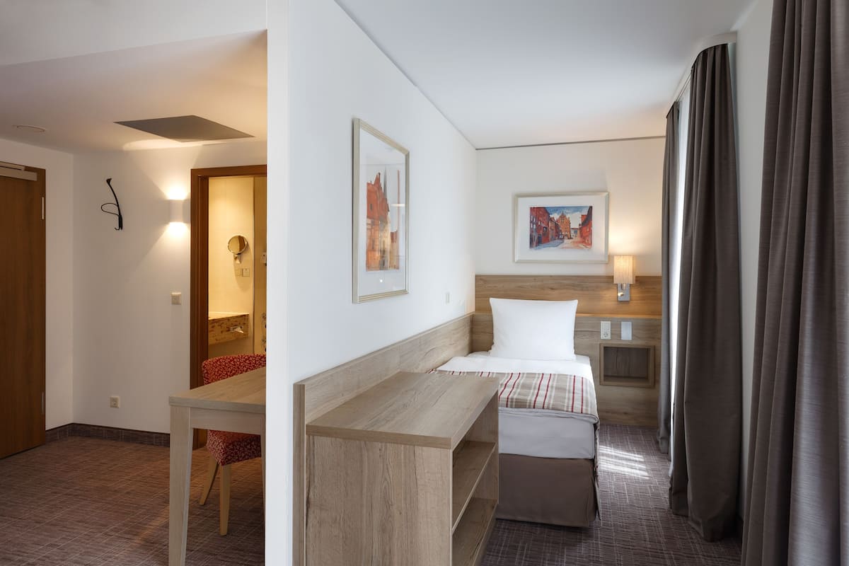 Premium kamer, 1 kingsize bed | 1 slaapkamer, donsdekens, een minibar, een kluis op de kamer