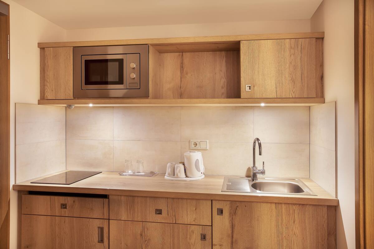 premium room, 1 king bed | private kitchen | coffee/tea maker