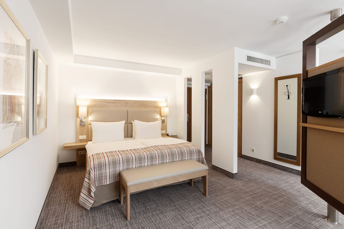 1 slaapkamer, donsdekens, een minibar, een kluis op de kamer