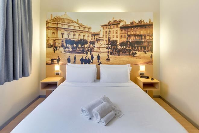 Luxe beddengoed, een minibar, een kluis op de kamer, een bureau