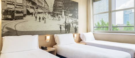 Luxe beddengoed, een minibar, een kluis op de kamer, een bureau