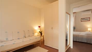 Family Room | 1 bedroom, in-room safe, soundproofing, free WiFi