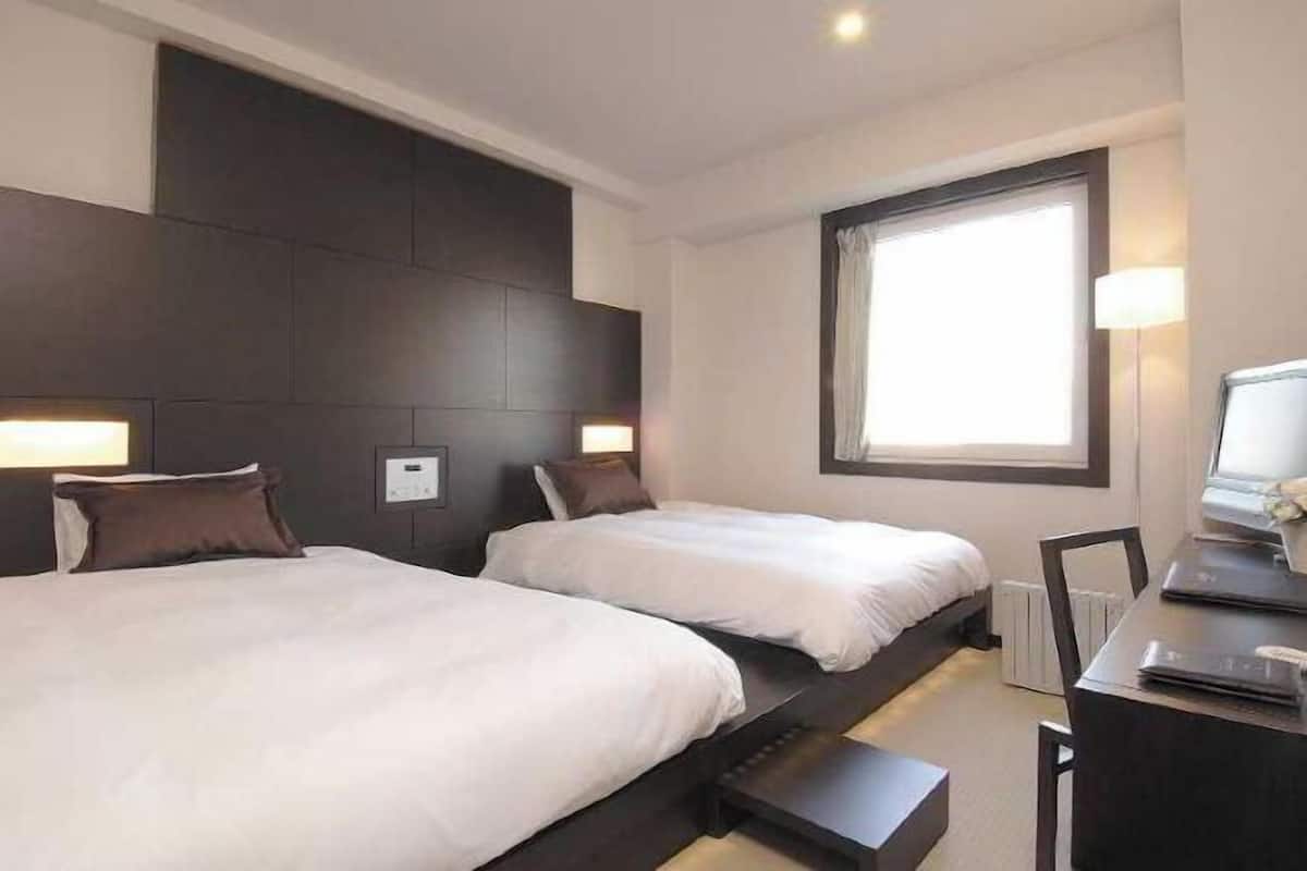 1 bedroom, desk, blackout drapes, iron/ironing board