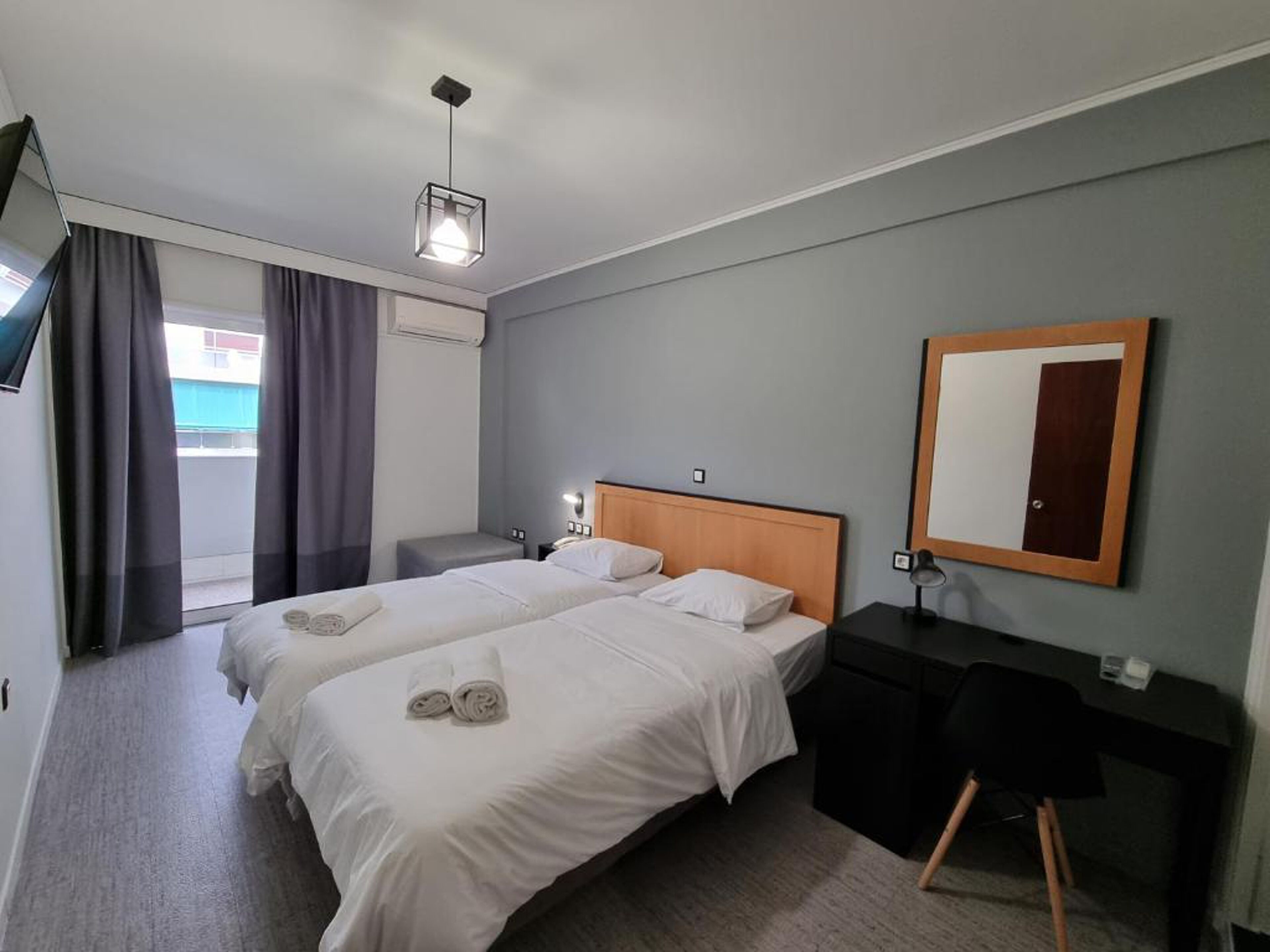 Economy Twin Room, 2 Twin Beds | 1 bedroom, desk, laptop workspace, blackout drapes