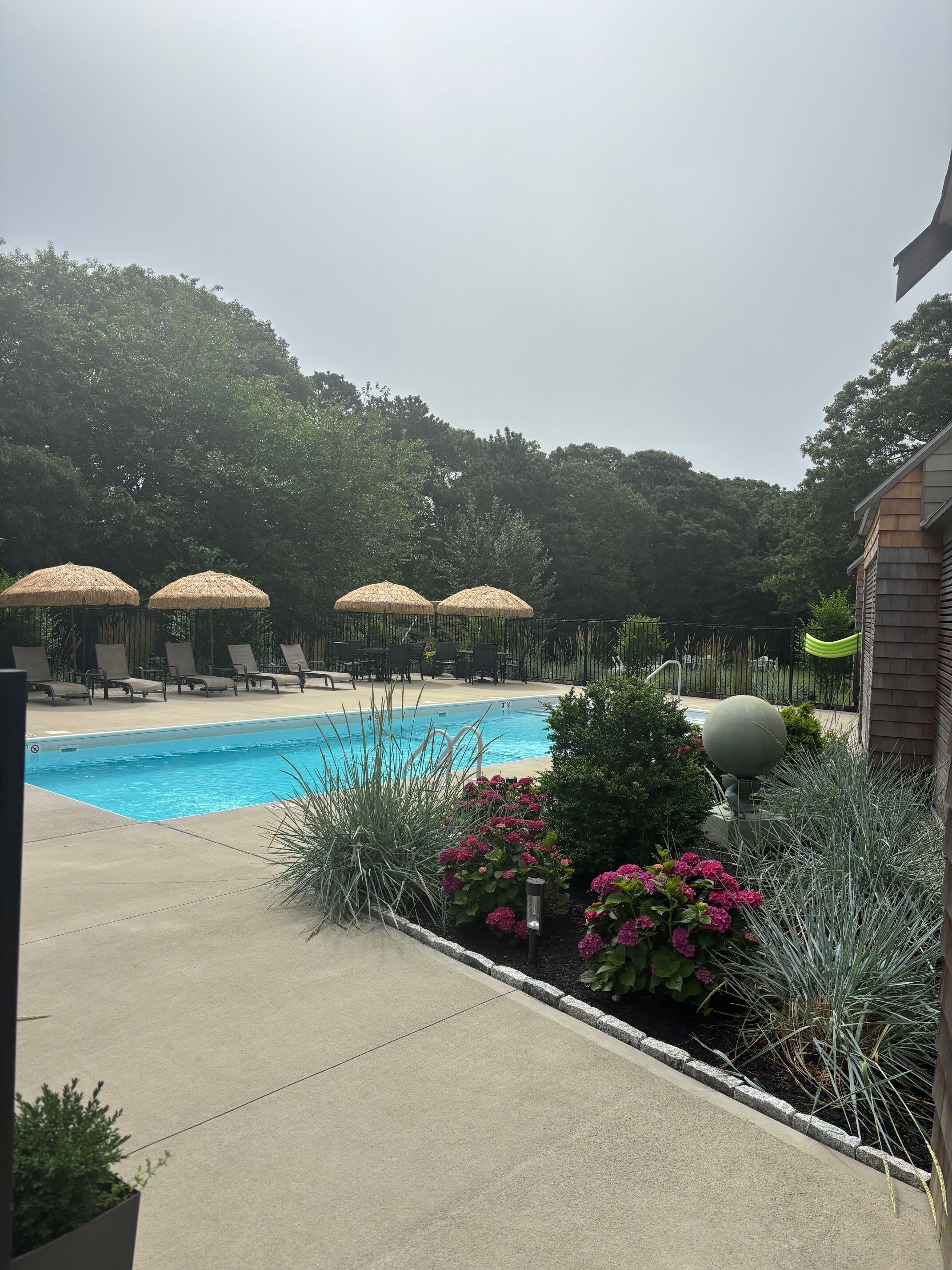 Seasonal outdoor pool, open 9:00 AM to 7:00 PM, pool umbrellas