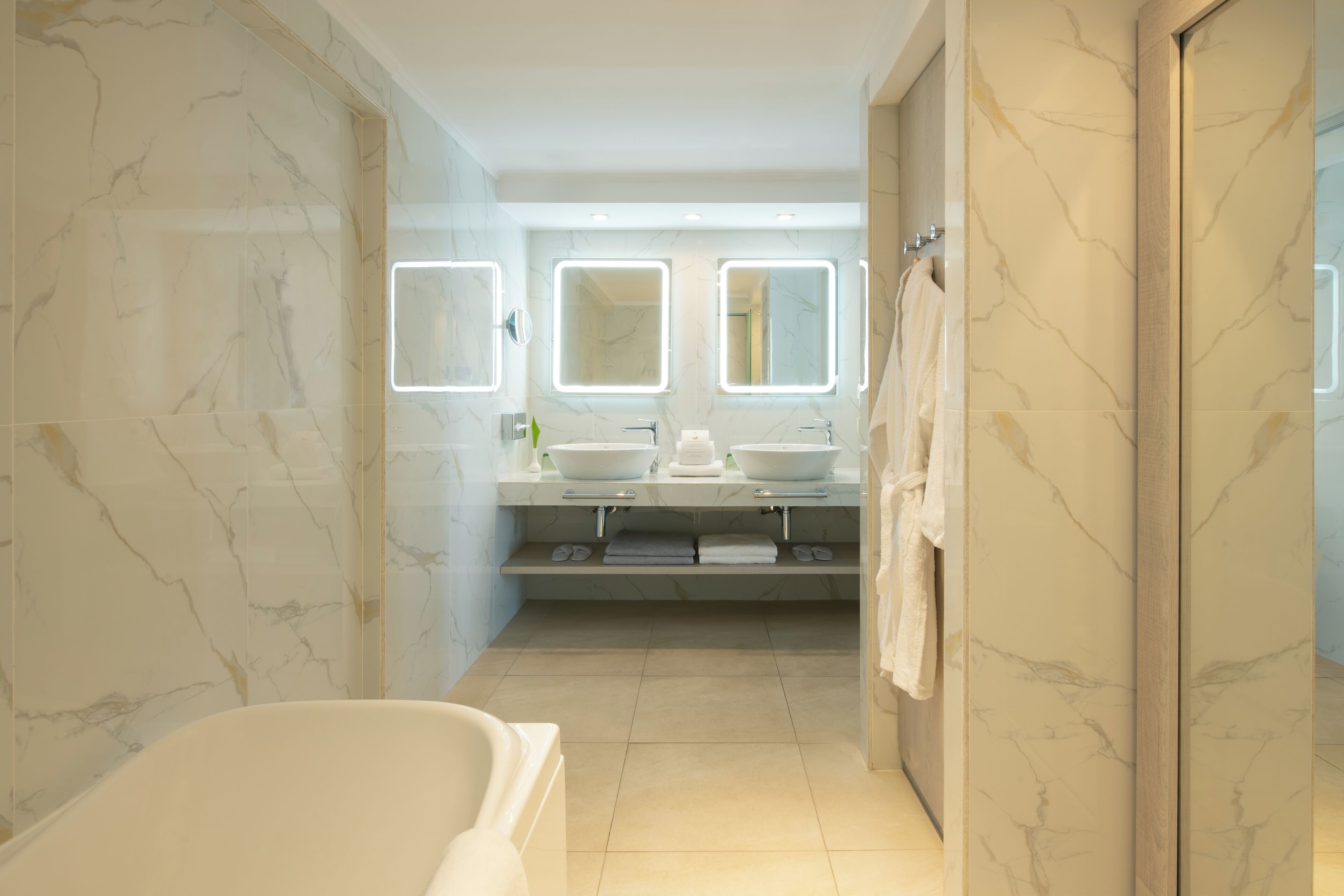 ambassador suite private pool | bathroom | designer toiletries, hair dryer, bathrobes, slippers