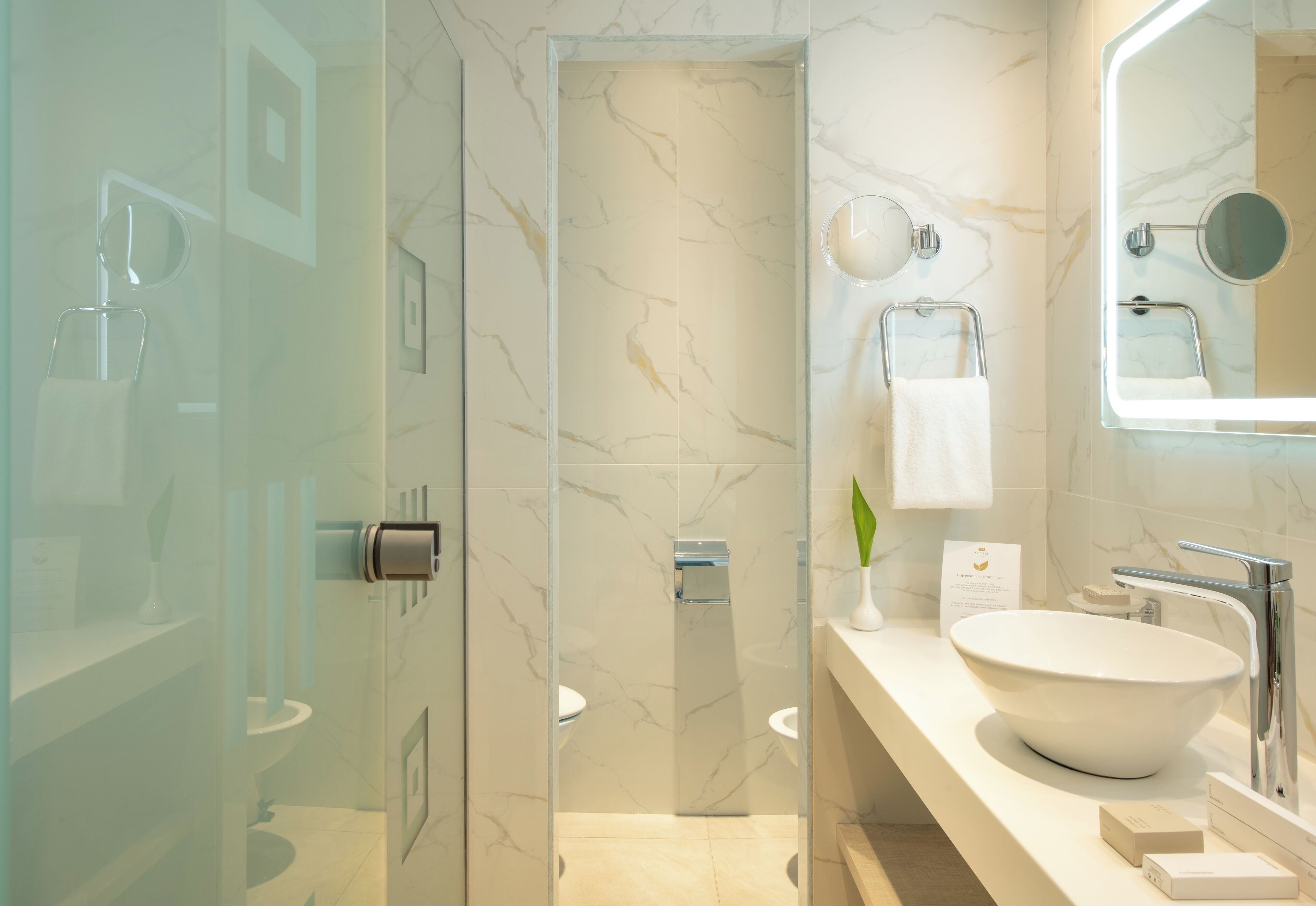 ambassador suite private pool | bathroom | designer toiletries, hair dryer, bathrobes, slippers