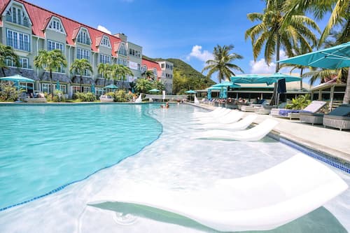 Outdoor pool, open 7:00 AM to 7:00 PM, pool umbrellas, sun loungers