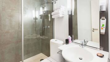 Shower, eco-friendly toiletries, hair dryer, towels