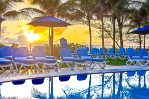 Outdoor pool, pool umbrellas, pool loungers