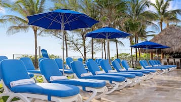 Outdoor pool, pool umbrellas, sun loungers