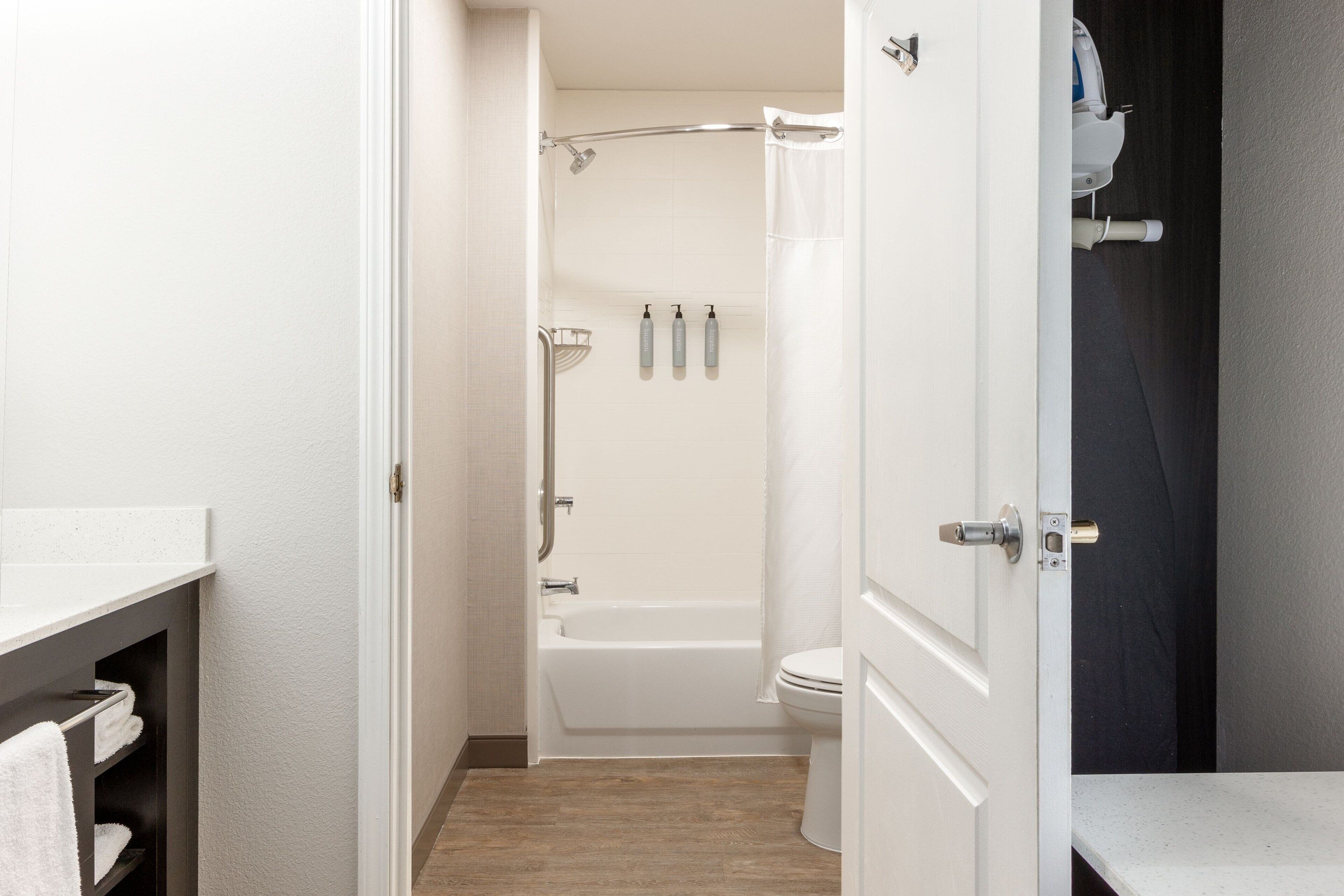 combined shower/bathtub, free toiletries, hair dryer, towels