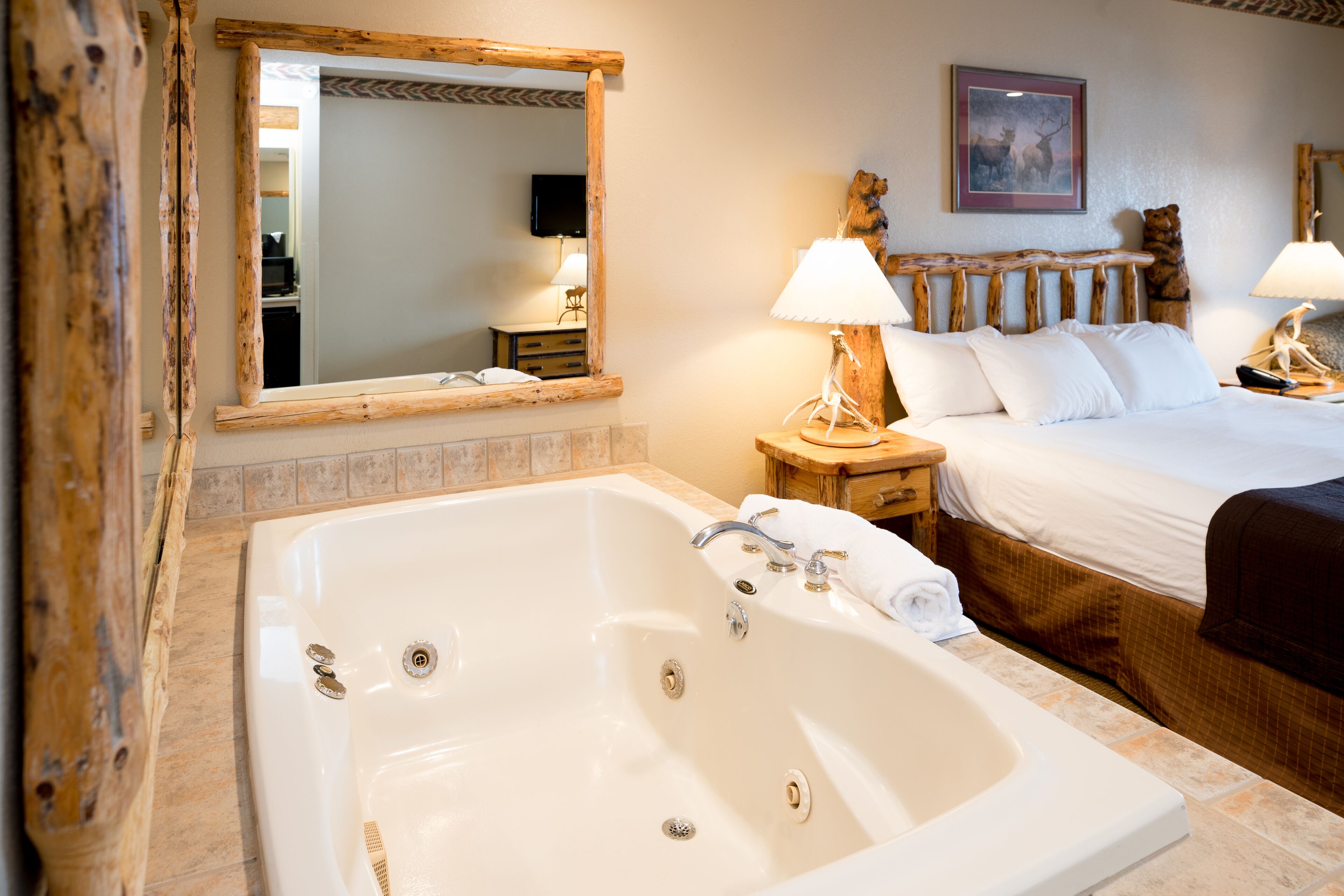 whirlpool fireplace suite – waterpark included | in-room safe, iron/ironing board, internet, bed sheets