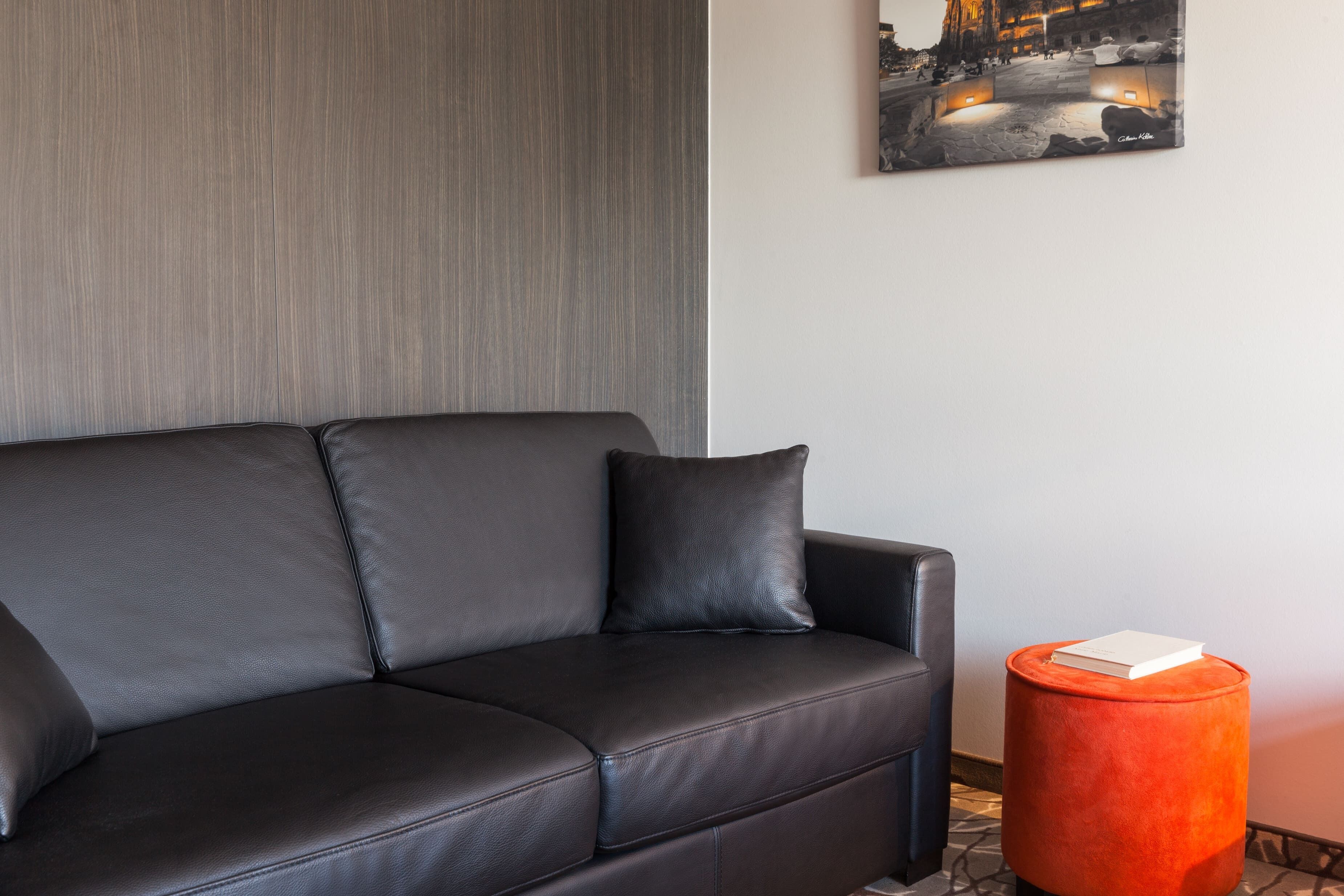 executive quadruple room | living area | flat-screen tv