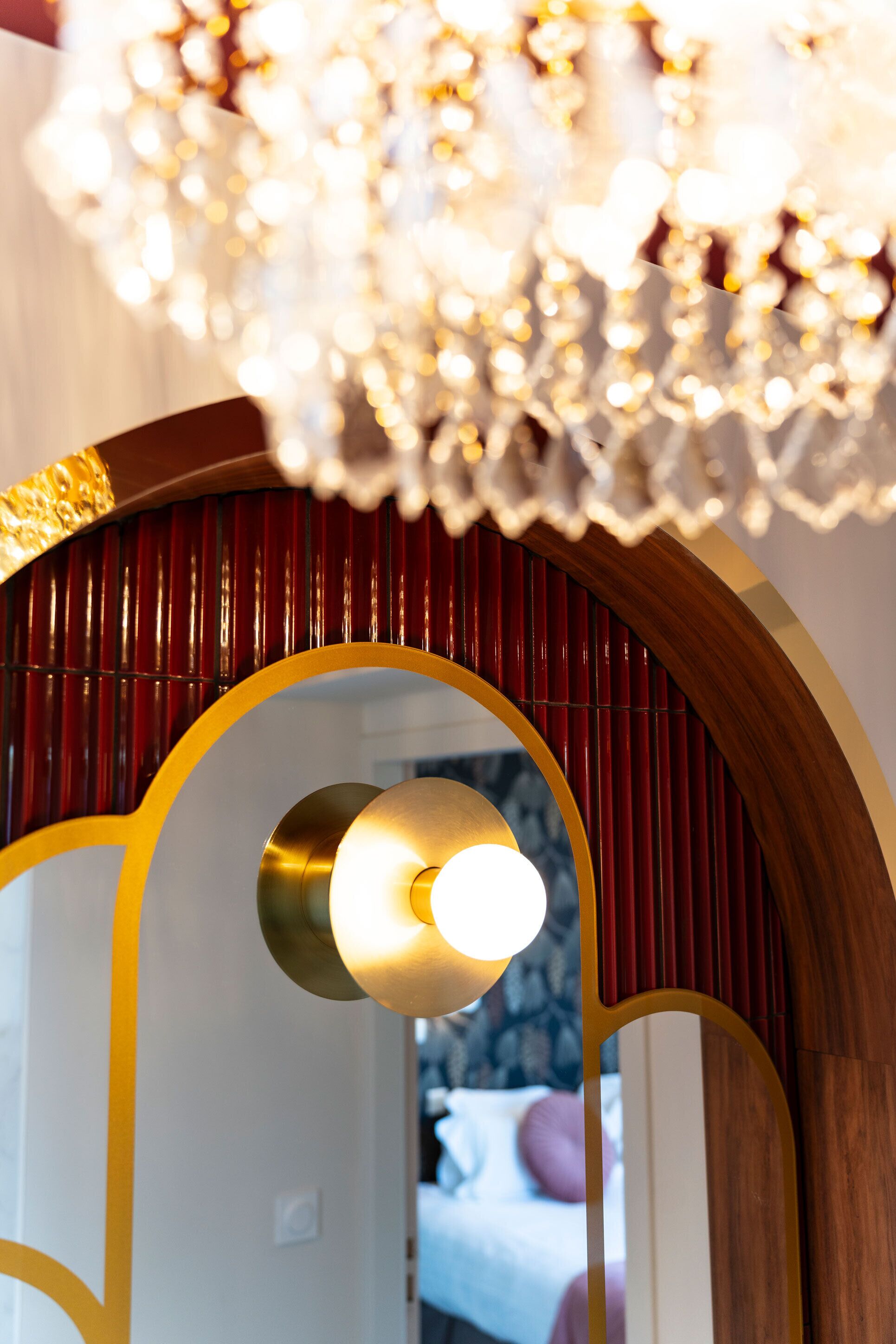 A chandelier with multiple light bulbs and a wooden frame.