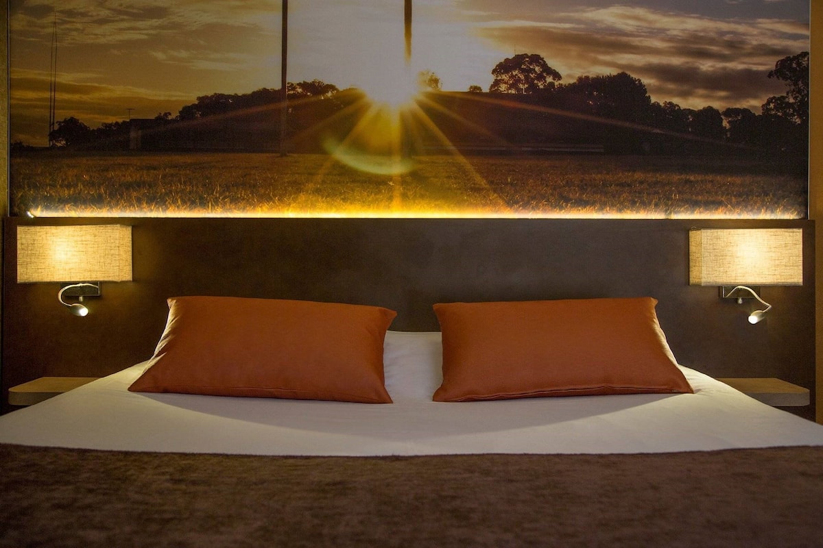 Premium bedding, individually furnished, desk, laptop workspace