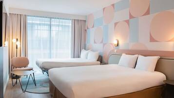 Premium bedding, desk, blackout curtains, soundproofing