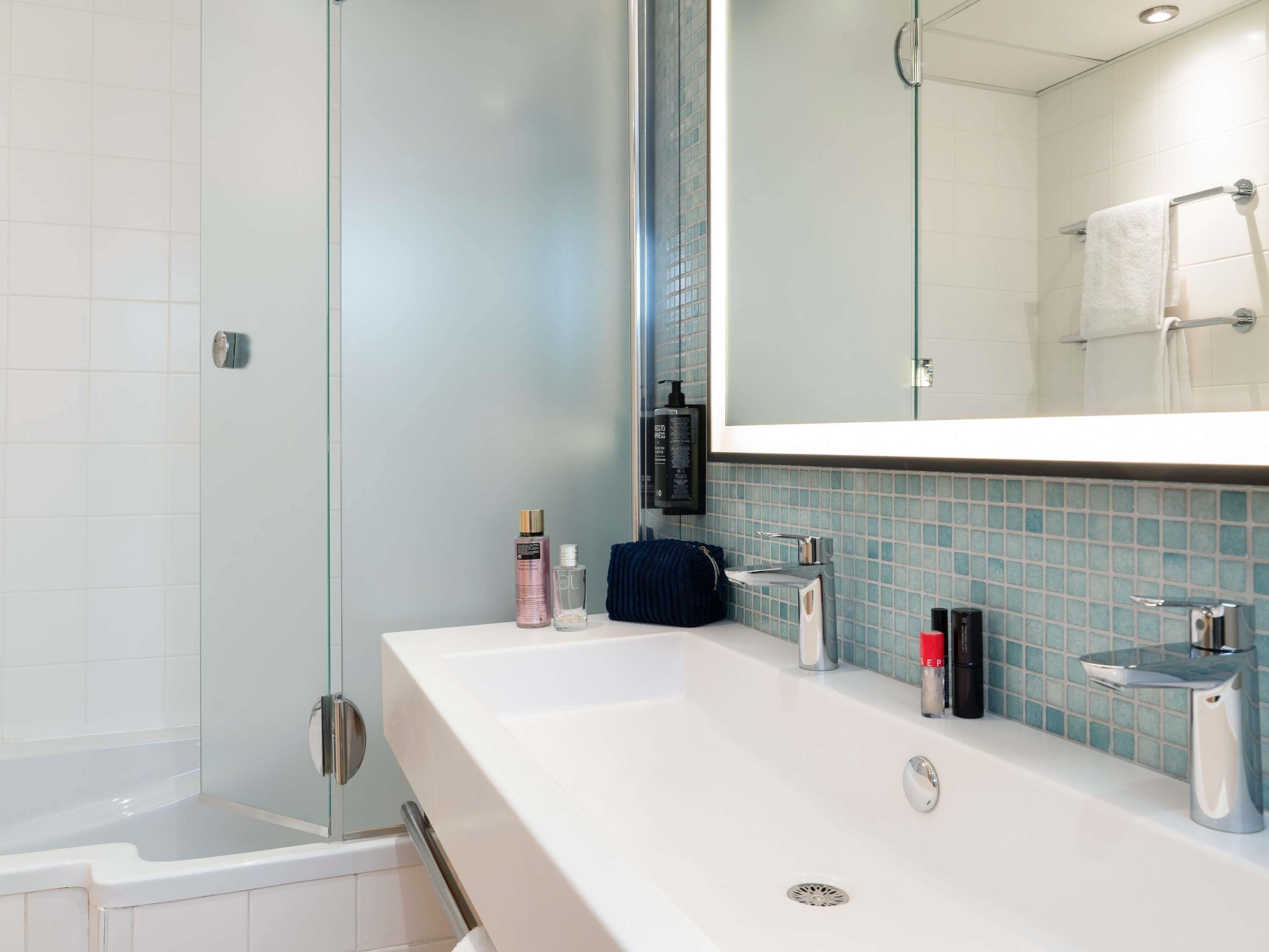 Eco-friendly toiletries, hair dryer, towels