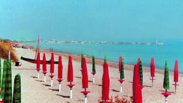 Private beach, white sand, sun-loungers, beach umbrellas